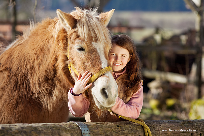 kids horse riding in mongolia